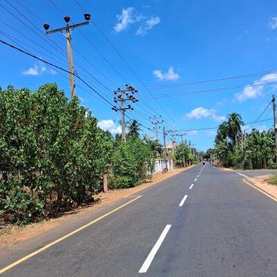 Puthur Achuveli till the moon Main street front with house